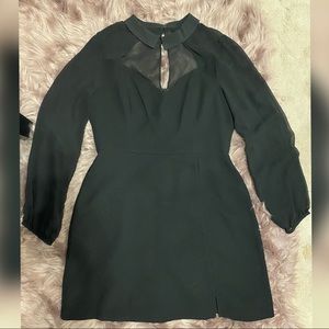 Black collared dress, with slit detail